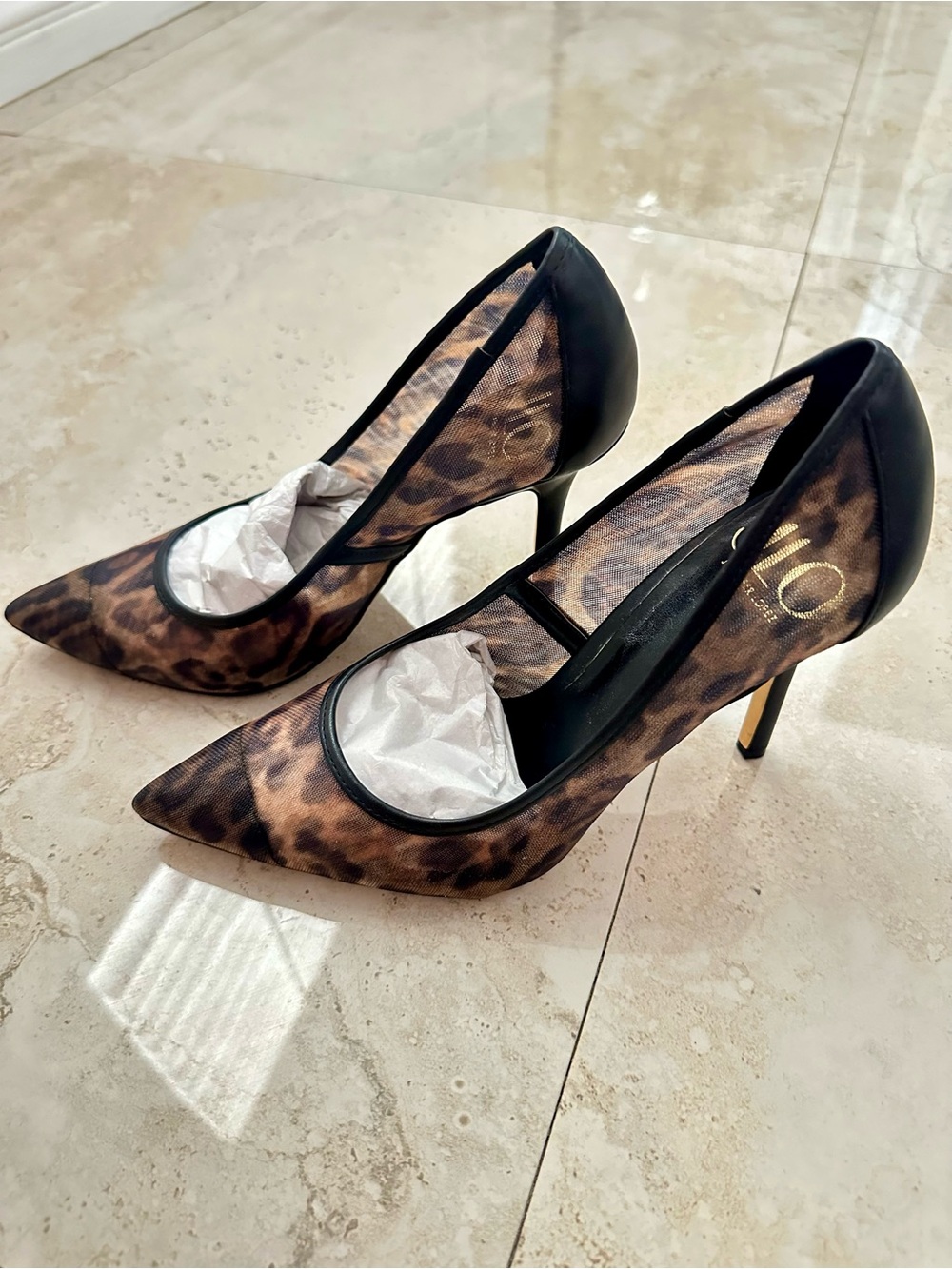 Jennifer Lopez Leopard Print Pointed Toe Pumps with Black Trim